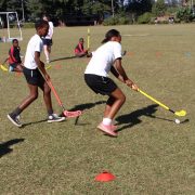 South African children playing hockey