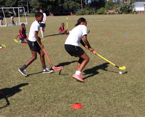 South African children playing hockey