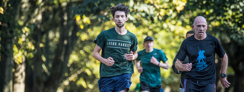 students running at woodhouse moor during the parkrun