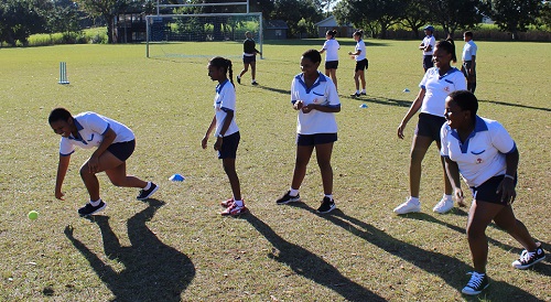 south african students playing cricket
