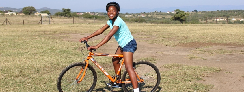 South African student on a bike