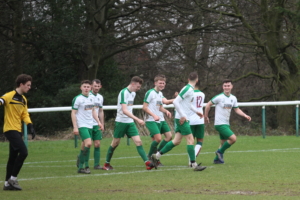 men's football 2s celebrating a goal - one of three promotions on 19th feb