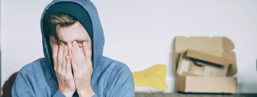 Man with head in his hands