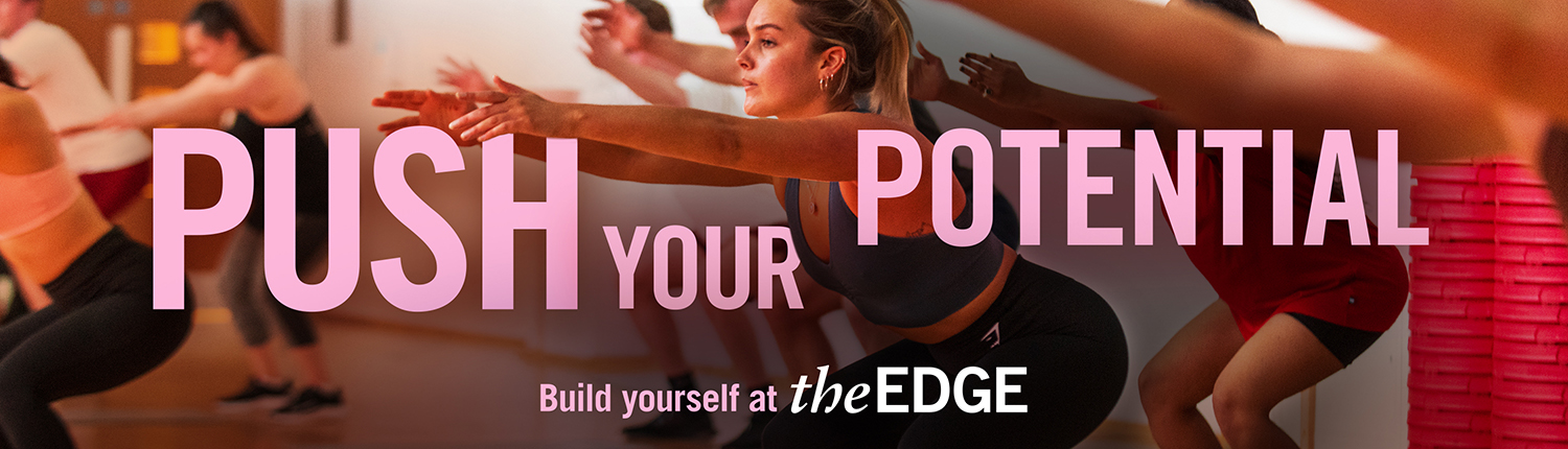 People squatting with extended arms in an exercise class. Text says: 'Push your potential. Build yourself at The Edge'