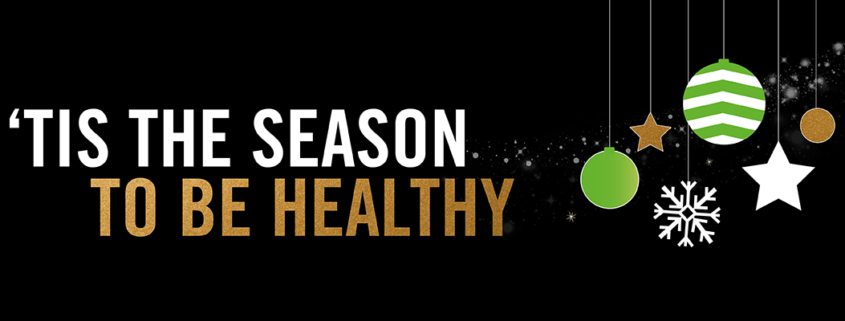 Website header which says "tis the season to be healthy" illustrated with Christmas drawings. Festive season at The Edge