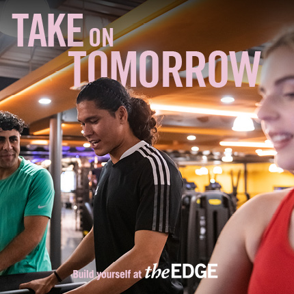 People engaging in exercise class. Text says 'Take on tomorrow. Build yourself at The Edge.'