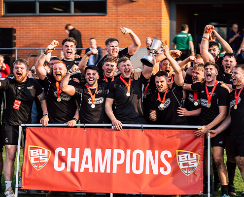 BUCS Cup event celebrations, team holding trophy and cheering