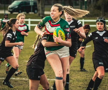 women playing rugby