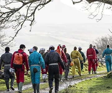 students walking with helmets