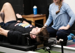 Member doing reformer pilates