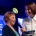 Woman receiving award on stage