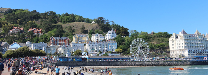 Llandudno coast with seaside and coastal buildings.