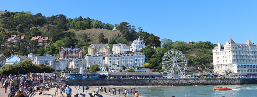 Llandudno coast with seaside and coastal buildings.