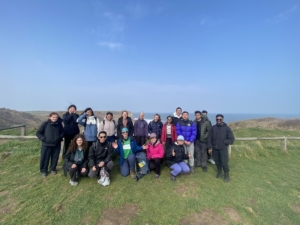 A group of walkers posing for a photo on the coast at Flamborough.