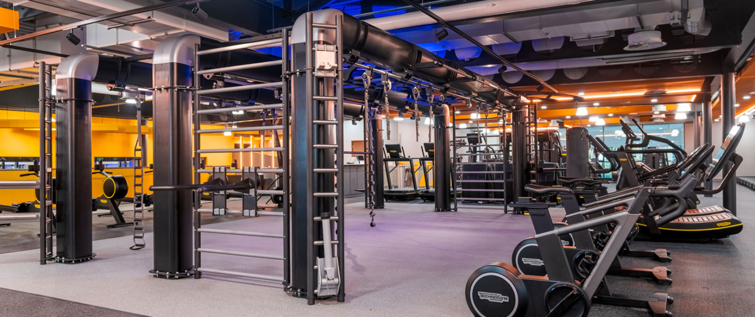 Gym floor with exercise bikes and functional rig